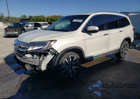 2019 Honda Pilot Touring z USA, uszkodzony, nr VIN 5FNYF5H6XKB037214